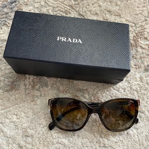 Prada Women’s Sunglasses.